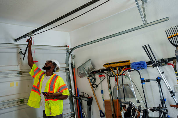 Professional Garage Door Installation technician working in South Shore, KY